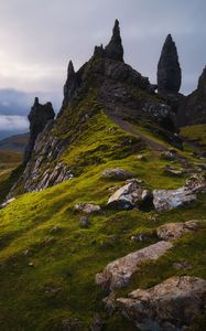 Preview wallpaper rocks, slope, grass, stones, valley