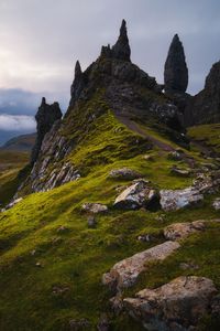 Preview wallpaper rocks, slope, grass, stones, valley