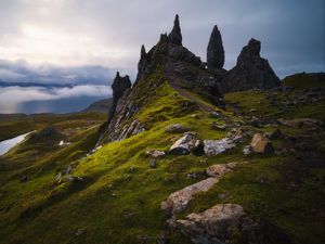 Preview wallpaper rocks, slope, grass, stones, valley