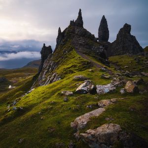 Preview wallpaper rocks, slope, grass, stones, valley