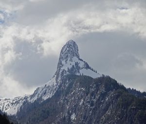 Preview wallpaper rocks, slope, snow, snowy, trees, mountains