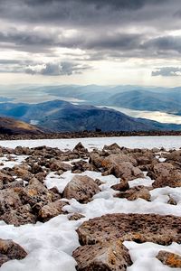 Preview wallpaper rocks, snow, distance