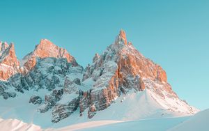 Preview wallpaper rocks, snow, man, winter, landscape