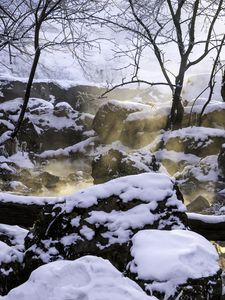 Preview wallpaper rocks, snow, winter, glow, steam