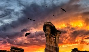 Preview wallpaper rocks, stone, birds, sunset, clouds