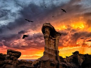 Preview wallpaper rocks, stone, birds, sunset, clouds