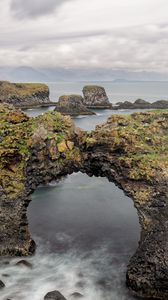 Preview wallpaper rocks, stones, arch, sea, clouds