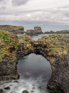 Preview wallpaper rocks, stones, arch, sea, clouds