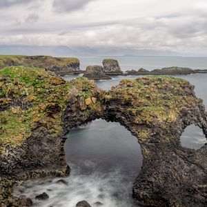 Preview wallpaper rocks, stones, arch, sea, clouds