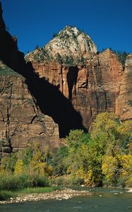 Preview wallpaper rocks, stones, mountain river, trees, autumn, branches, shade