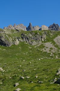 Preview wallpaper rocks, stones, mountains, grass, sky, slope