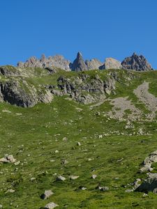 Preview wallpaper rocks, stones, mountains, grass, sky, slope