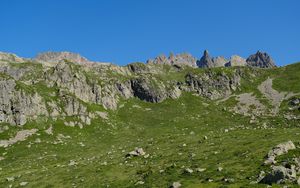 Preview wallpaper rocks, stones, mountains, grass, sky, slope