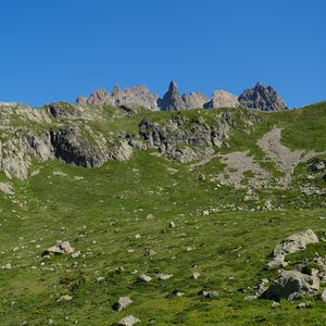 Preview wallpaper rocks, stones, mountains, grass, sky, slope