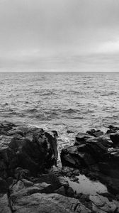 Preview wallpaper rocks, stones, sea, horizon, black and white