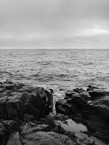 Preview wallpaper rocks, stones, sea, horizon, black and white