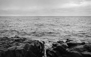Preview wallpaper rocks, stones, sea, horizon, black and white