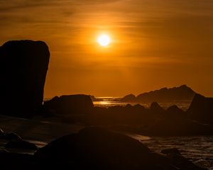 Preview wallpaper rocks, stones, sea, sun, dark