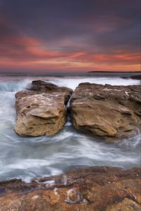 Preview wallpaper rocks, stones, sea, waves, surf, sunset