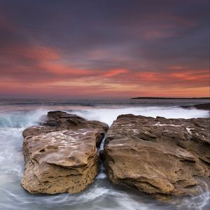 Preview wallpaper rocks, stones, sea, waves, surf, sunset