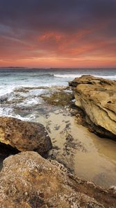 Preview wallpaper rocks, stones, sea, horizon, sunset
