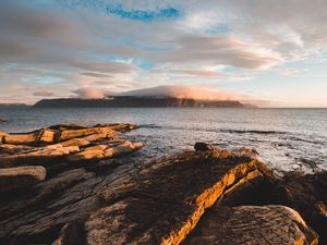 Preview wallpaper rocks, stones, sea, fog, clouds, horizon