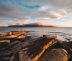 Preview wallpaper rocks, stones, sea, fog, clouds, horizon