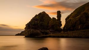 Preview wallpaper rocks, stones, sea, clouds, twilight