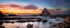 Preview wallpaper rocks, stones, sea, clouds, sunrise