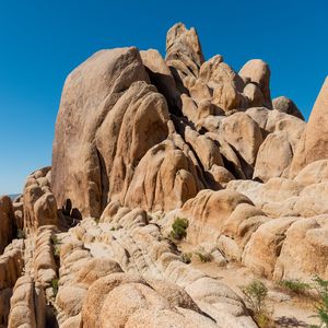 Preview wallpaper rocks, stones, stone, relief, bushes