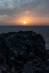 Preview wallpaper rocks, stones, sunset, sun, ocean