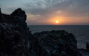 Preview wallpaper rocks, stones, sunset, sun, ocean