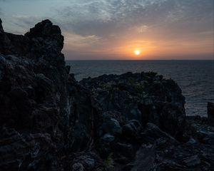 Preview wallpaper rocks, stones, sunset, sun, ocean