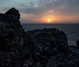 Preview wallpaper rocks, stones, sunset, sun, ocean