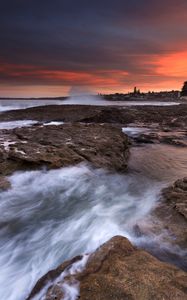 Preview wallpaper rocks, stones, surf, sea, sunset