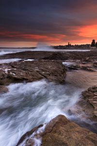 Preview wallpaper rocks, stones, surf, sea, sunset