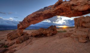 Preview wallpaper rocks, sun, clouds, sunset, nature, landscape