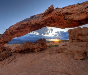 Preview wallpaper rocks, sun, clouds, sunset, nature, landscape