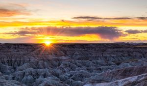 Preview wallpaper rocks, sunset, dusk, sun, rays