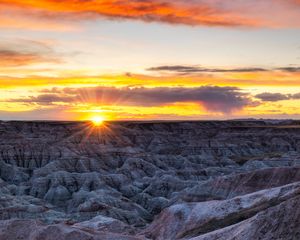 Preview wallpaper rocks, sunset, dusk, sun, rays