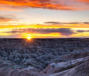 Preview wallpaper rocks, sunset, dusk, sun, rays