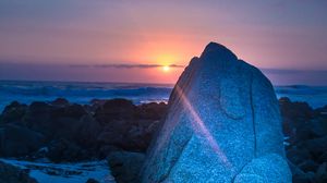 Preview wallpaper rocks, sunset, rays, sea, twilight