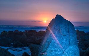Preview wallpaper rocks, sunset, rays, sea, twilight