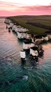 Preview wallpaper rocks, sunset, sea, coast, island