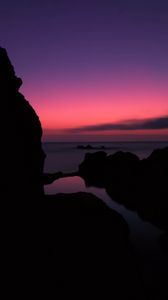 Preview wallpaper rocks, sunset, sea, horizon, sky