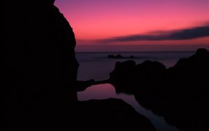 Preview wallpaper rocks, sunset, sea, horizon, sky