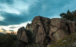 Preview wallpaper rocks, trees, clouds, evening