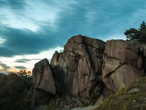 Preview wallpaper rocks, trees, clouds, evening