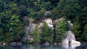 Preview wallpaper rocks, trees, lake, vegetation, water smooth surface