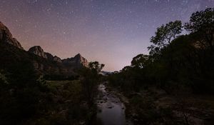 Preview wallpaper rocks, trees, river, stars, sky, night, landscape